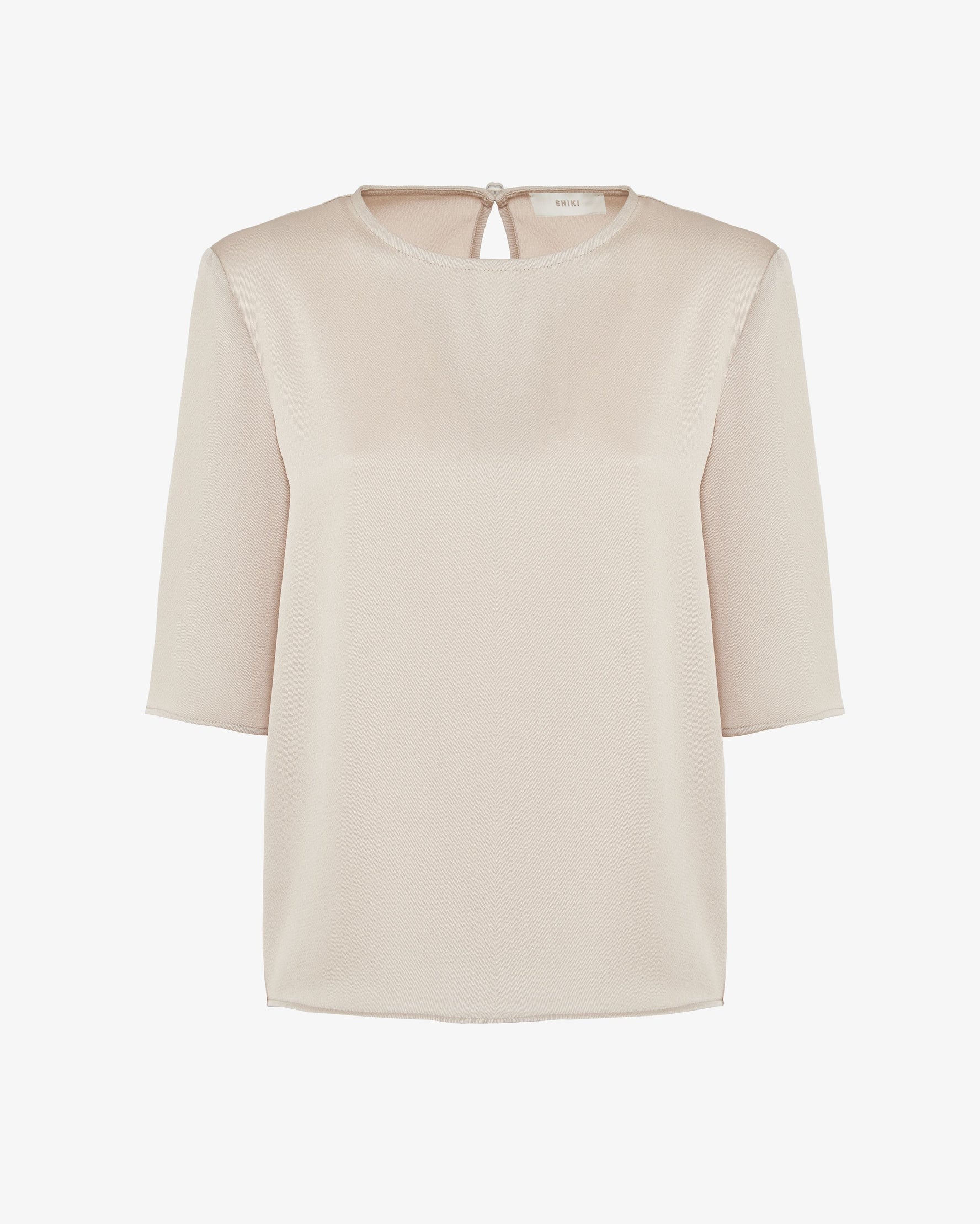 Blusa essenziale con scollo tondo
