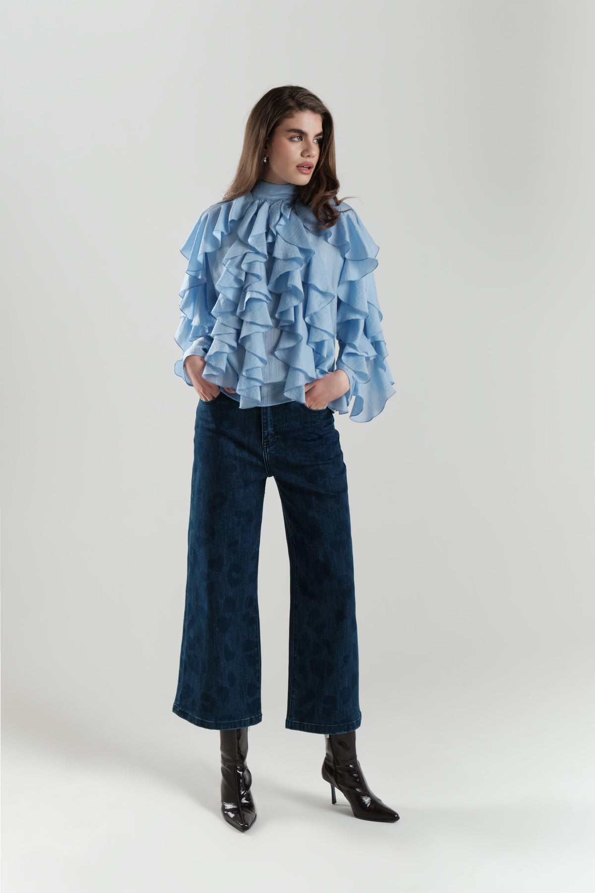 Blusa con rouches a maniche lunghe