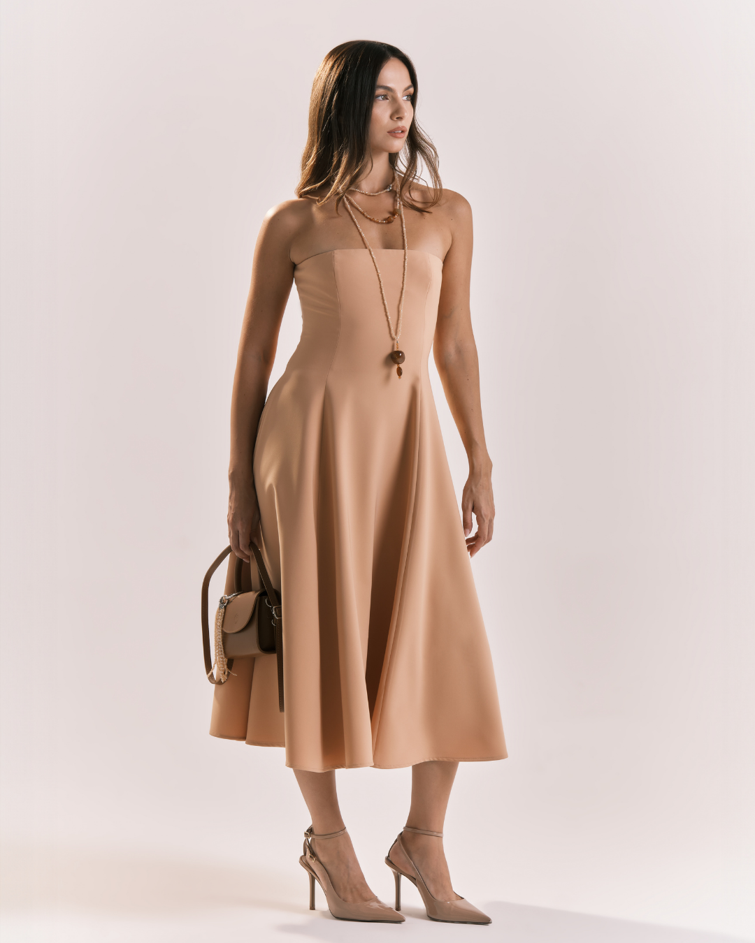 Abito bustier con gonna ampia