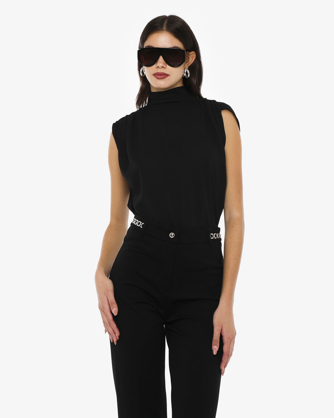 Blusa collo alto senza maniche in georgette