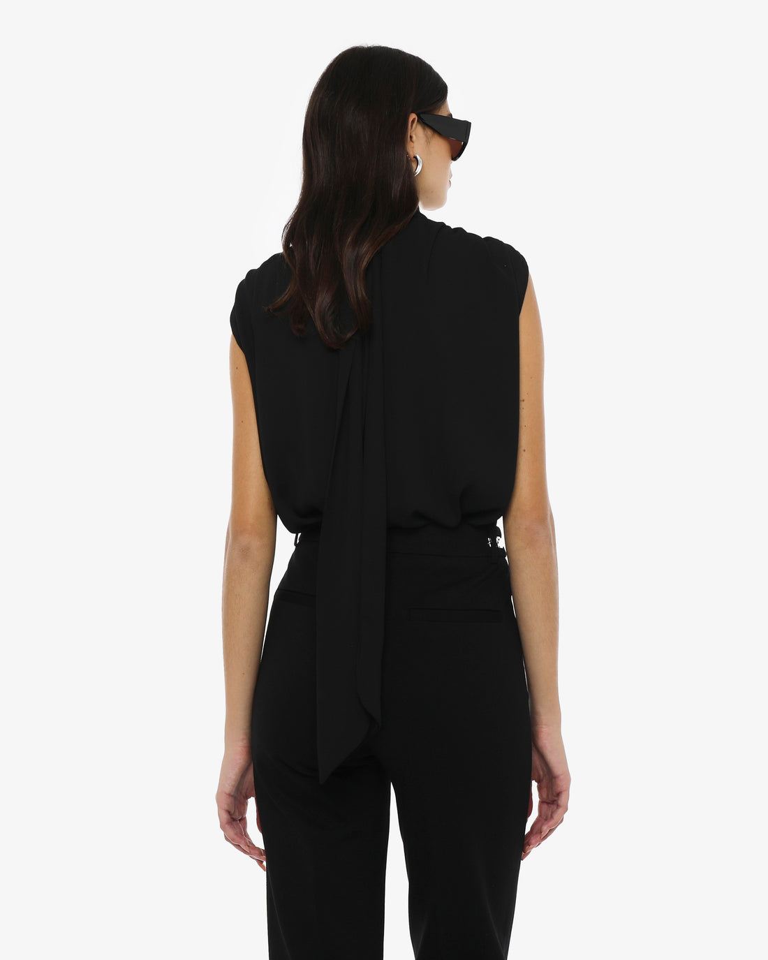 Blusa collo alto senza maniche in georgette