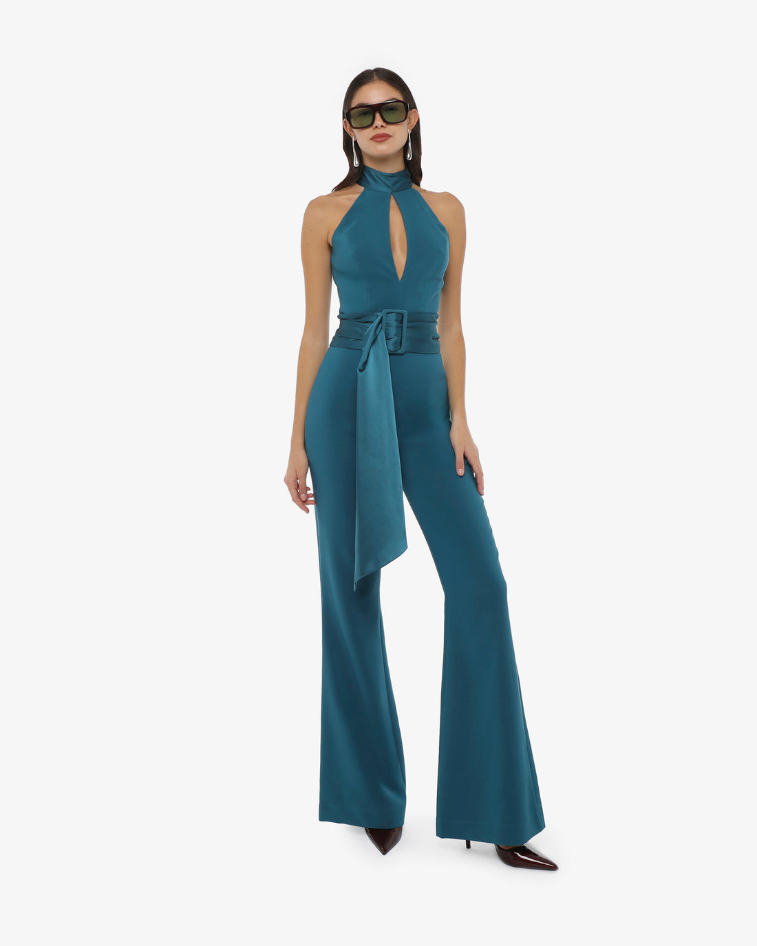 Tuta cut out con collo america e fusciacca in tessuto tecnico