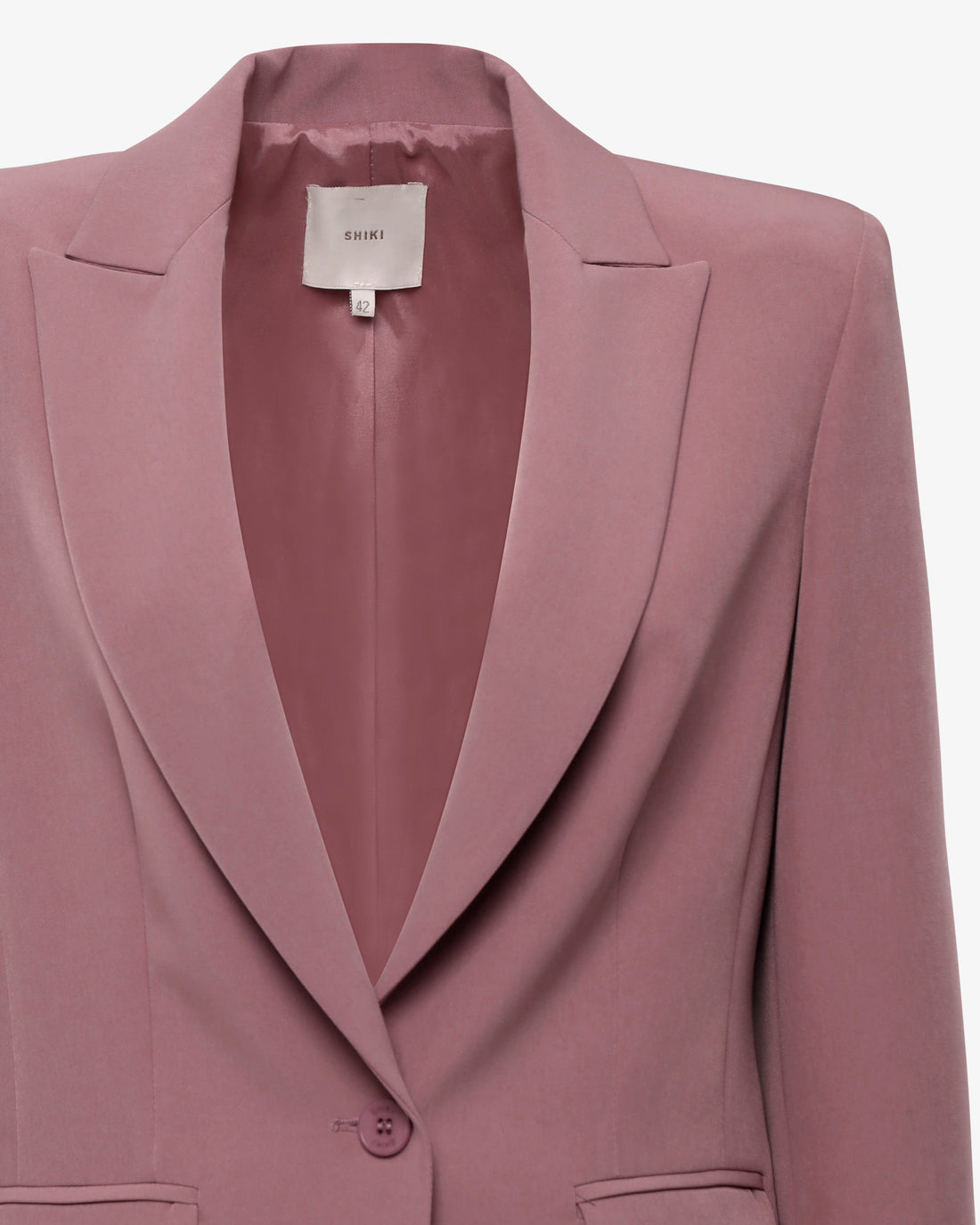 Tailleur con giacca monopetto e pantalone flare