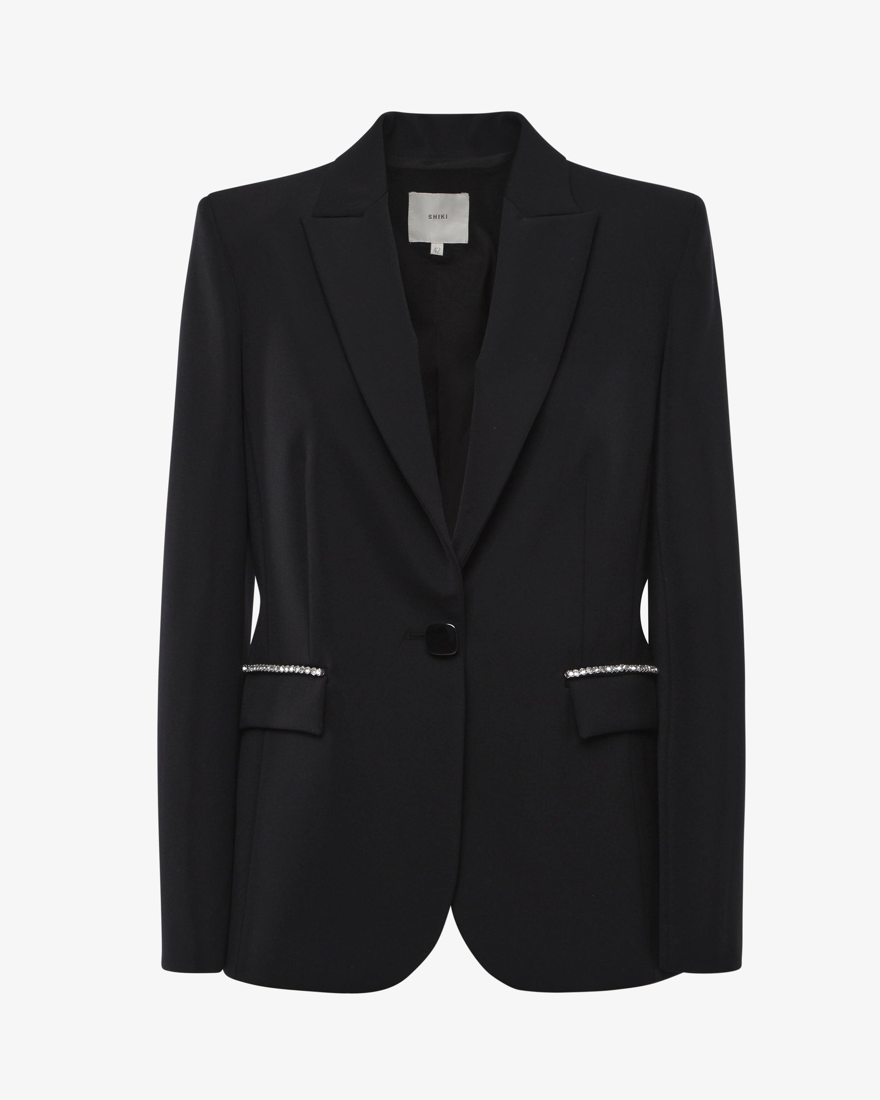 Tailleur con giacca monopetto e pantaloni slim con dettagli swarosvki