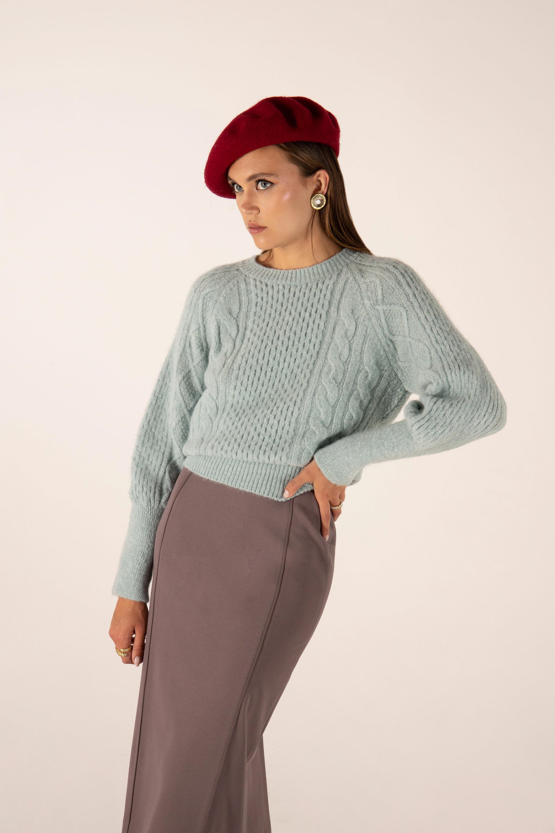 Pullover in maglia a trecce girocollo