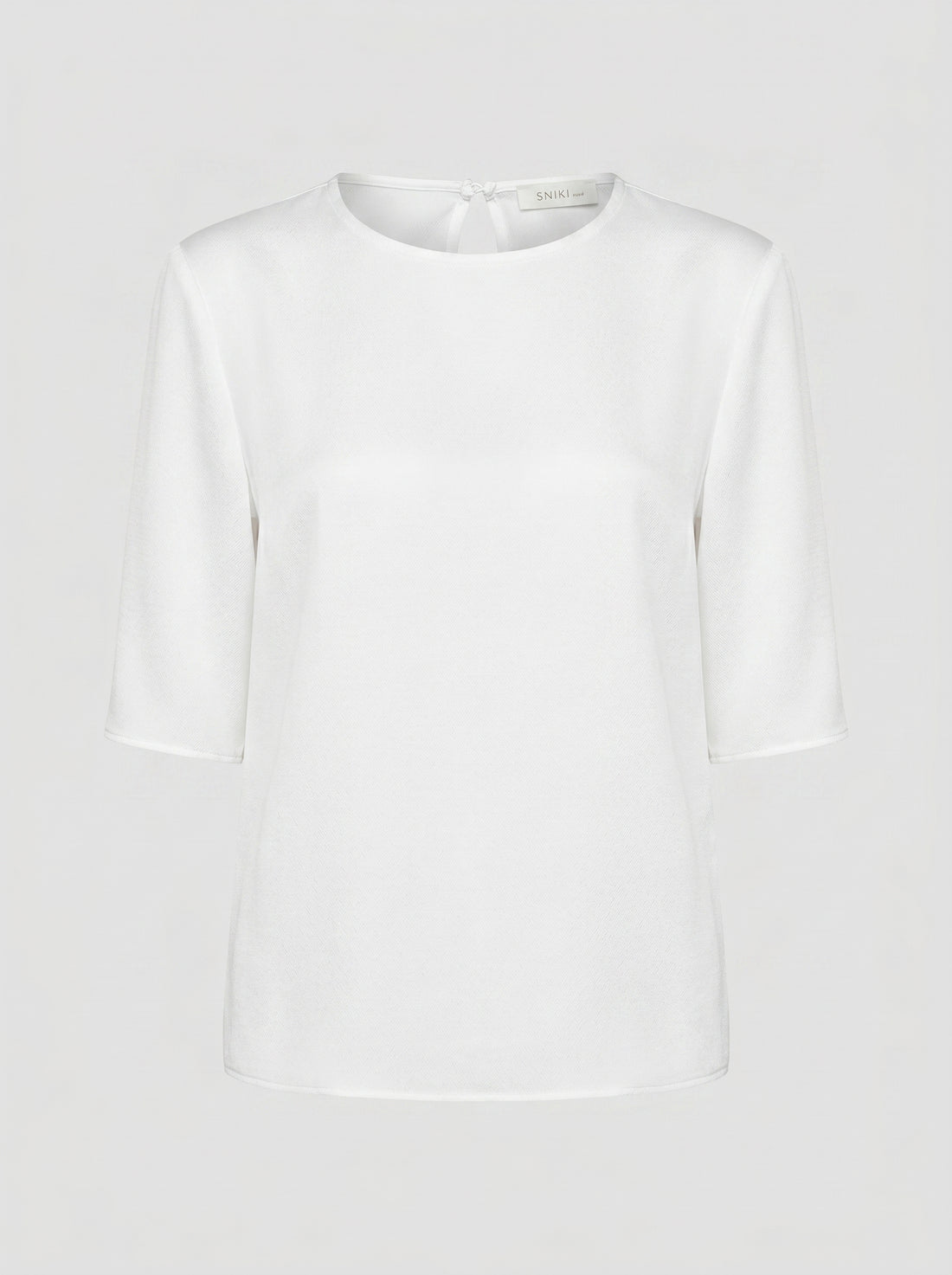 Blusa essenziale con scollo tondo
