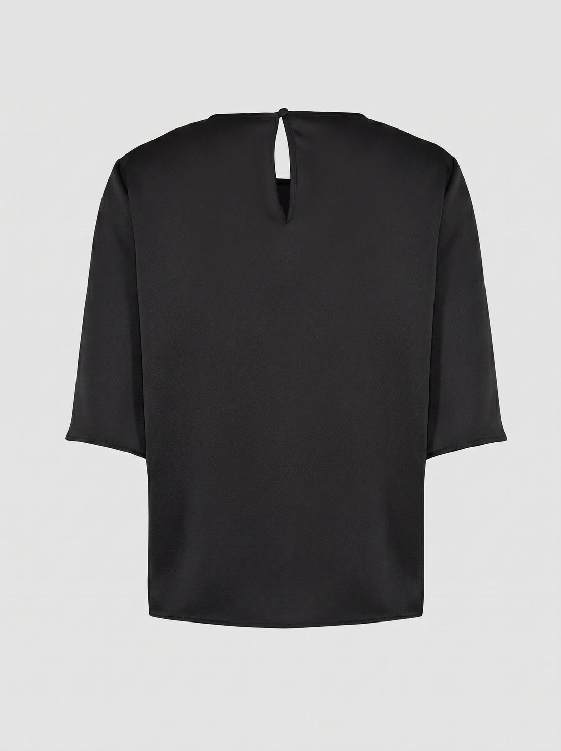 Blusa essenziale con scollo tondo