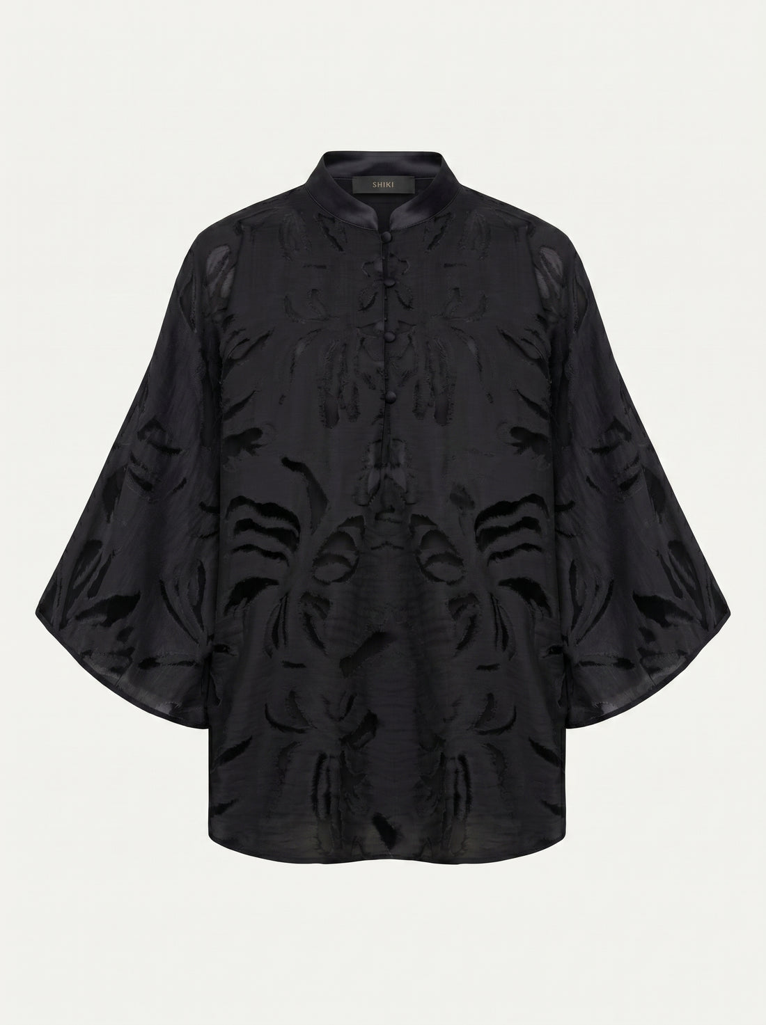 Blusa con maniche a campana